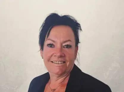 Professional woman in business attire smiling representing Fran Cox CFO property investment financial leadership and strategy