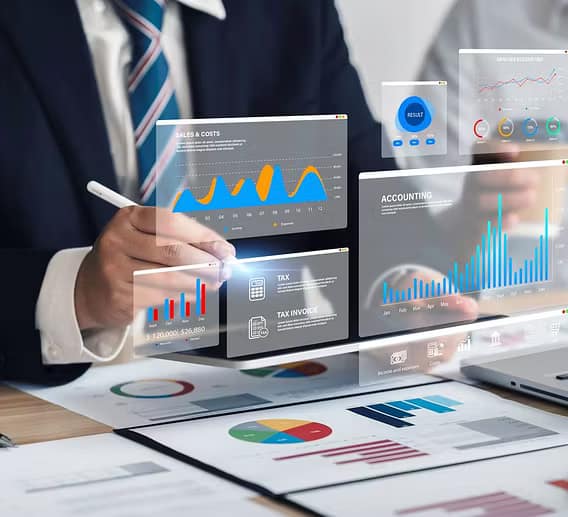 Business professionals discussing documents for property investment company formation services in the UK for buy to let investors